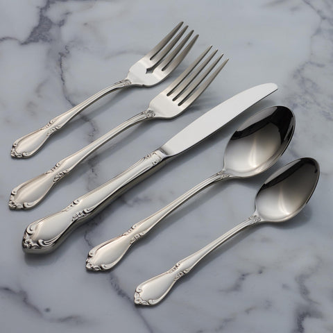 Oneida Chateau fork detail shows scrolling flowers for a refined look.