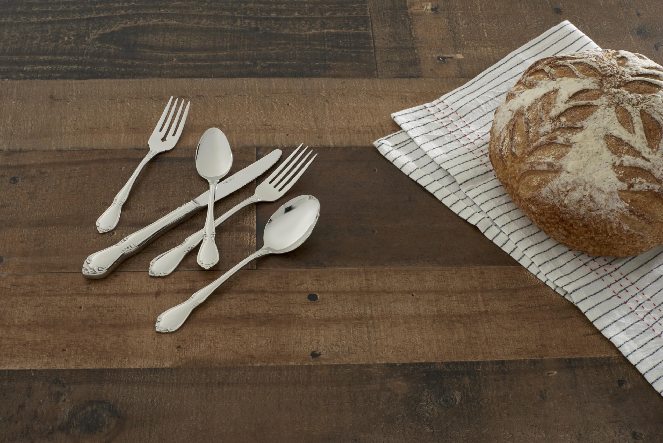Oneida Chateau dinner fork on table setting communicates enduring quality.