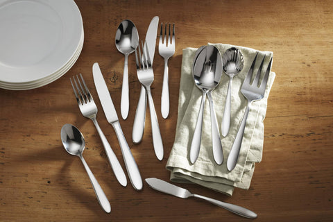 Oneida Mooncrest butter knife; smooth edge for spreading at table.