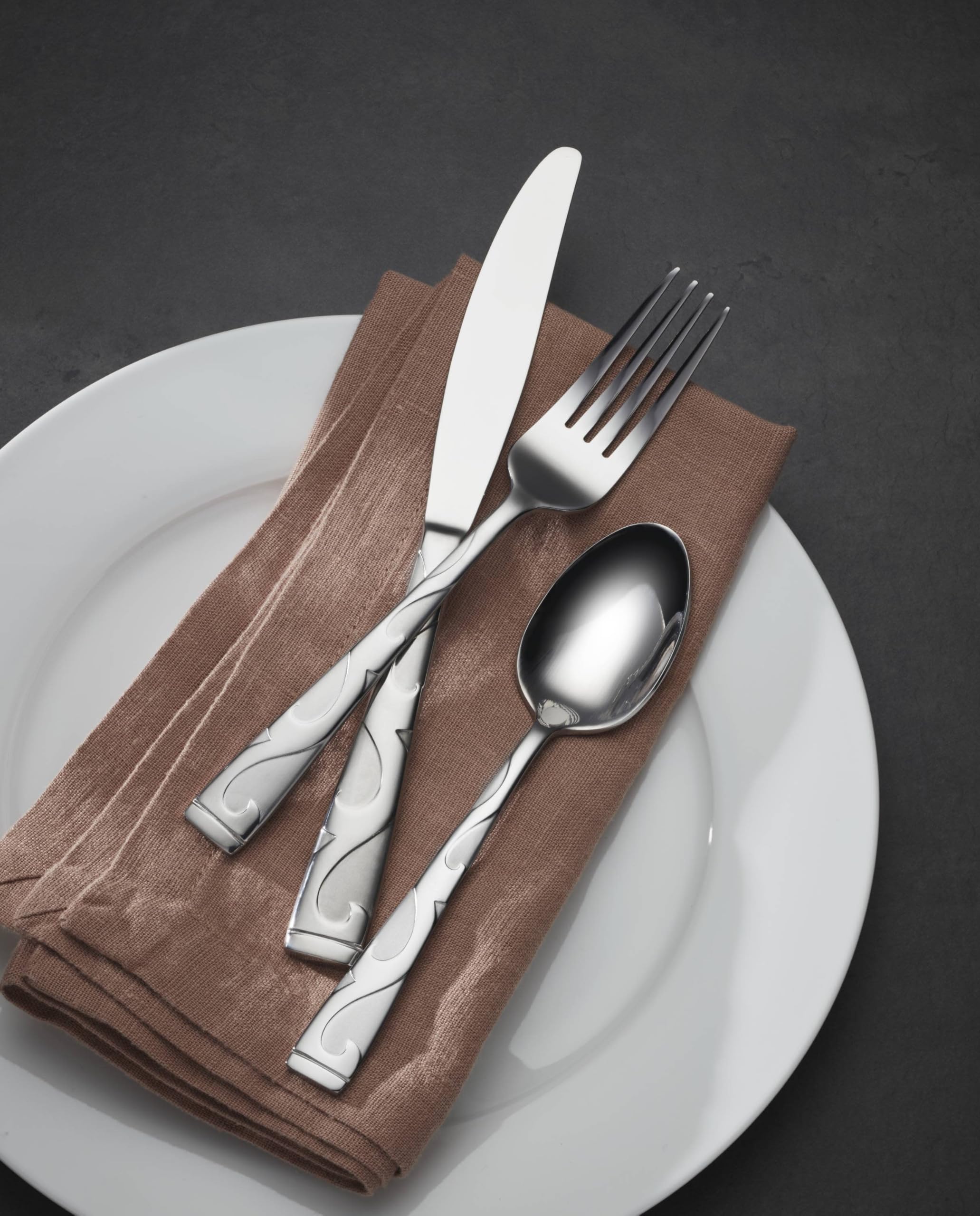 Oneida Tuscany place setting featuring coordinated flatware