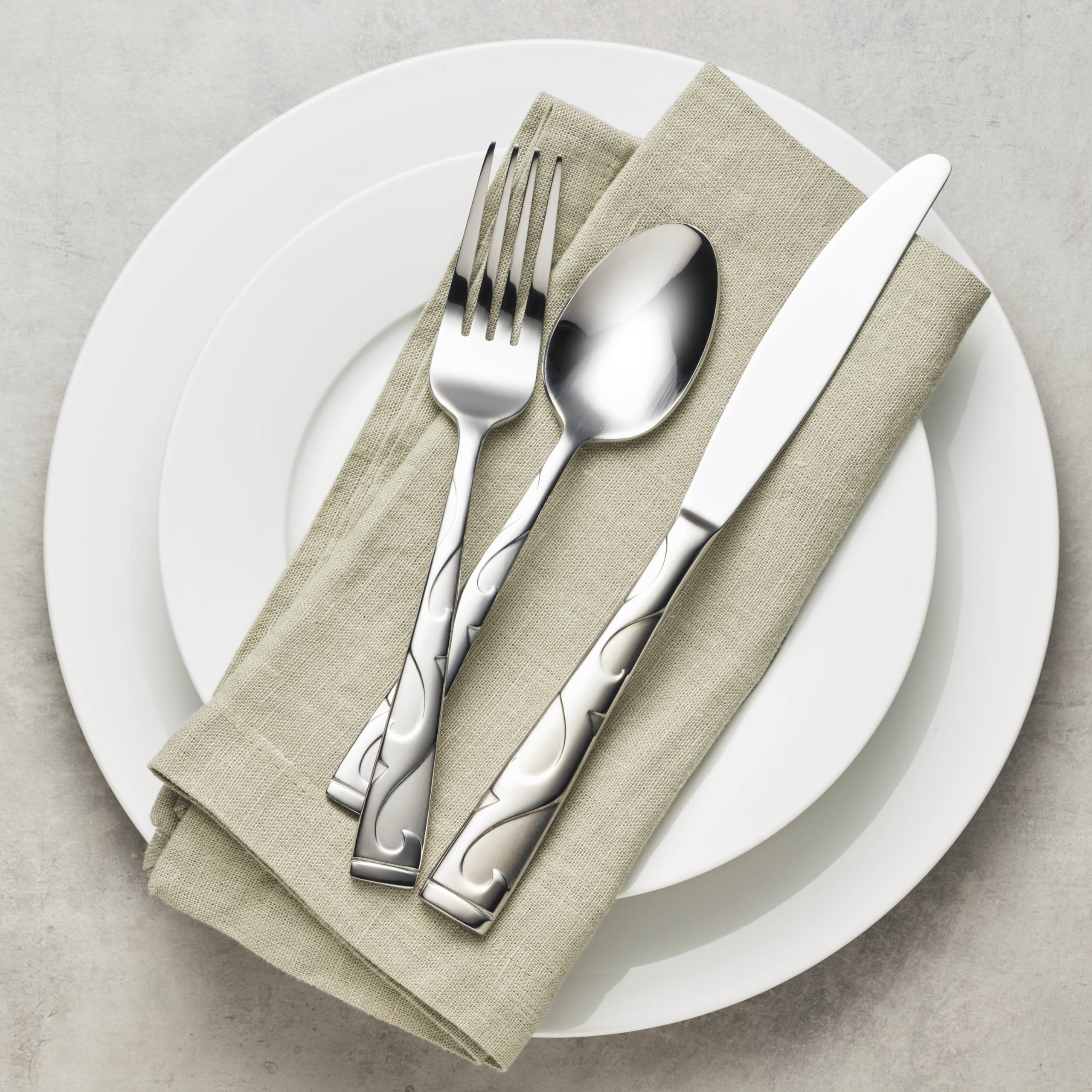 Close-up of Tuscany scrollwork texture on the flatware