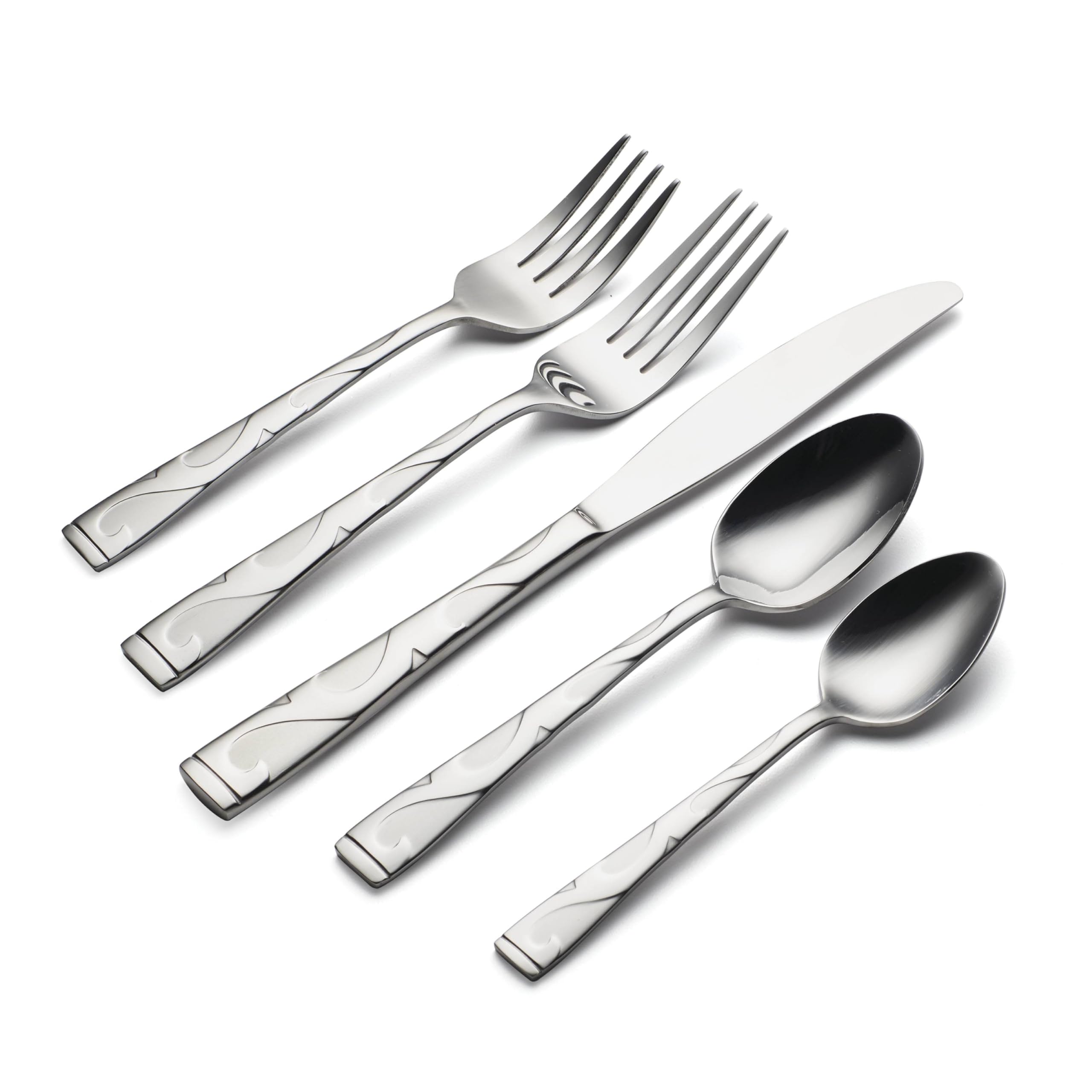 Serving spoons and meat fork from Oneida Tuscany on a table