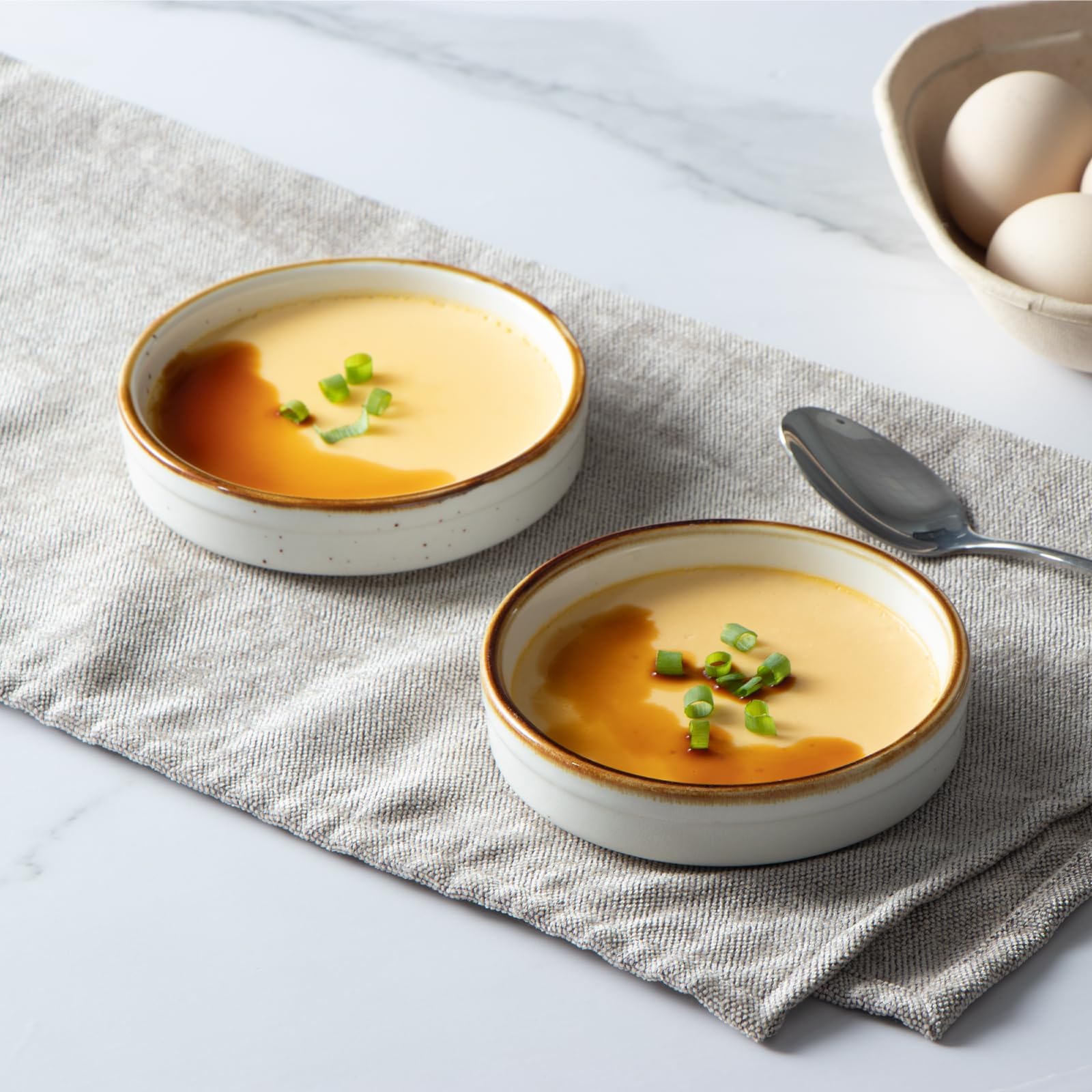 ONEMORE smooth-white ceramic ramekins elevate table presentation and versatility.