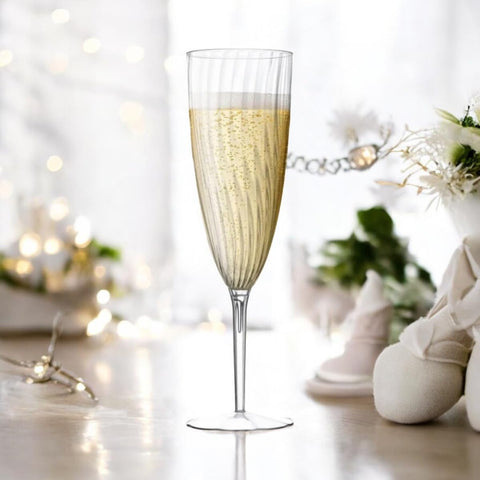 Oojami 6oz glasses shining during New Year toast celebrations