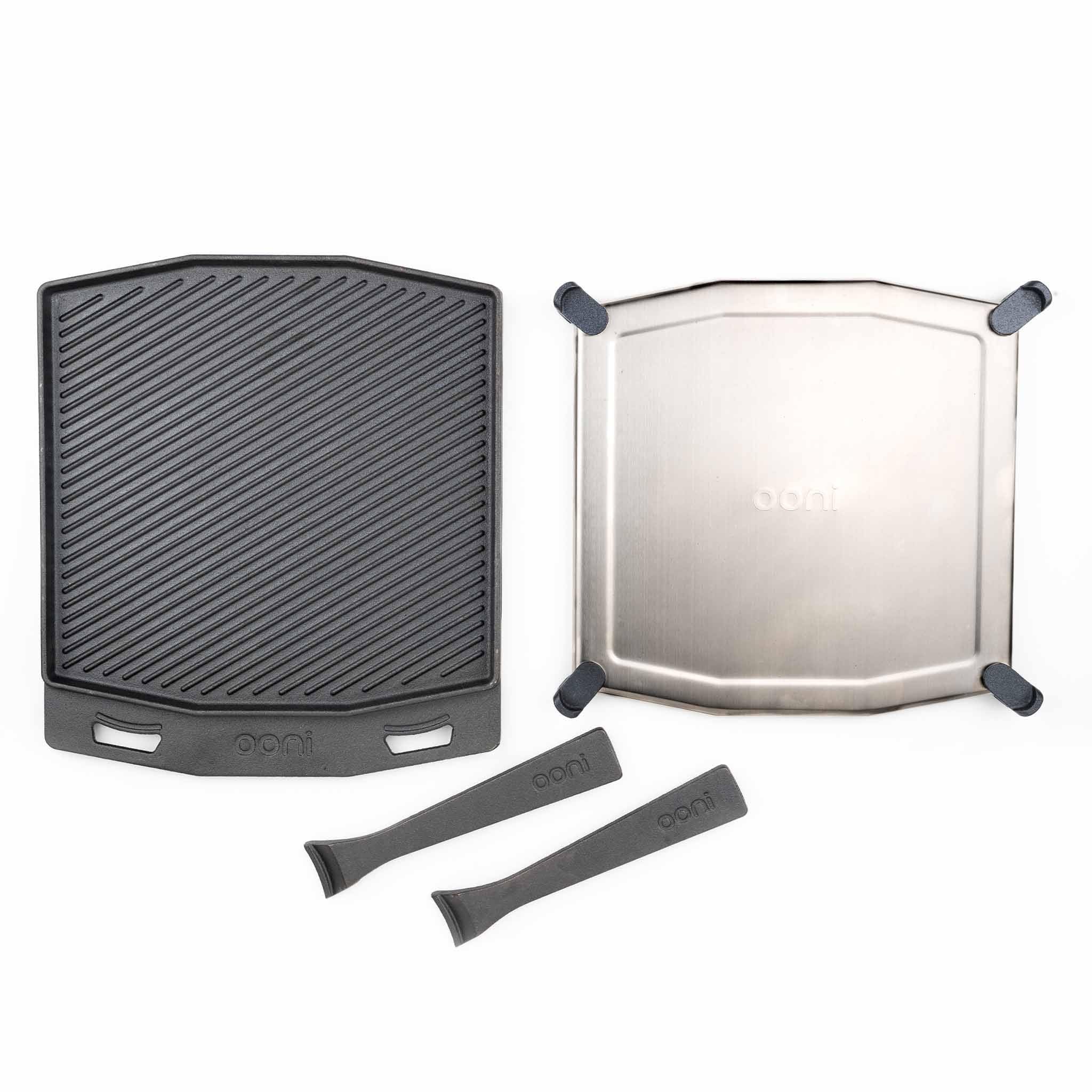 Ooni cast iron dual-sided grizzler plate in oven for versatile cooking