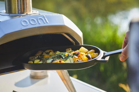 Ooni Cast Iron Sizzler Pan is oven safe for versatile cooking.