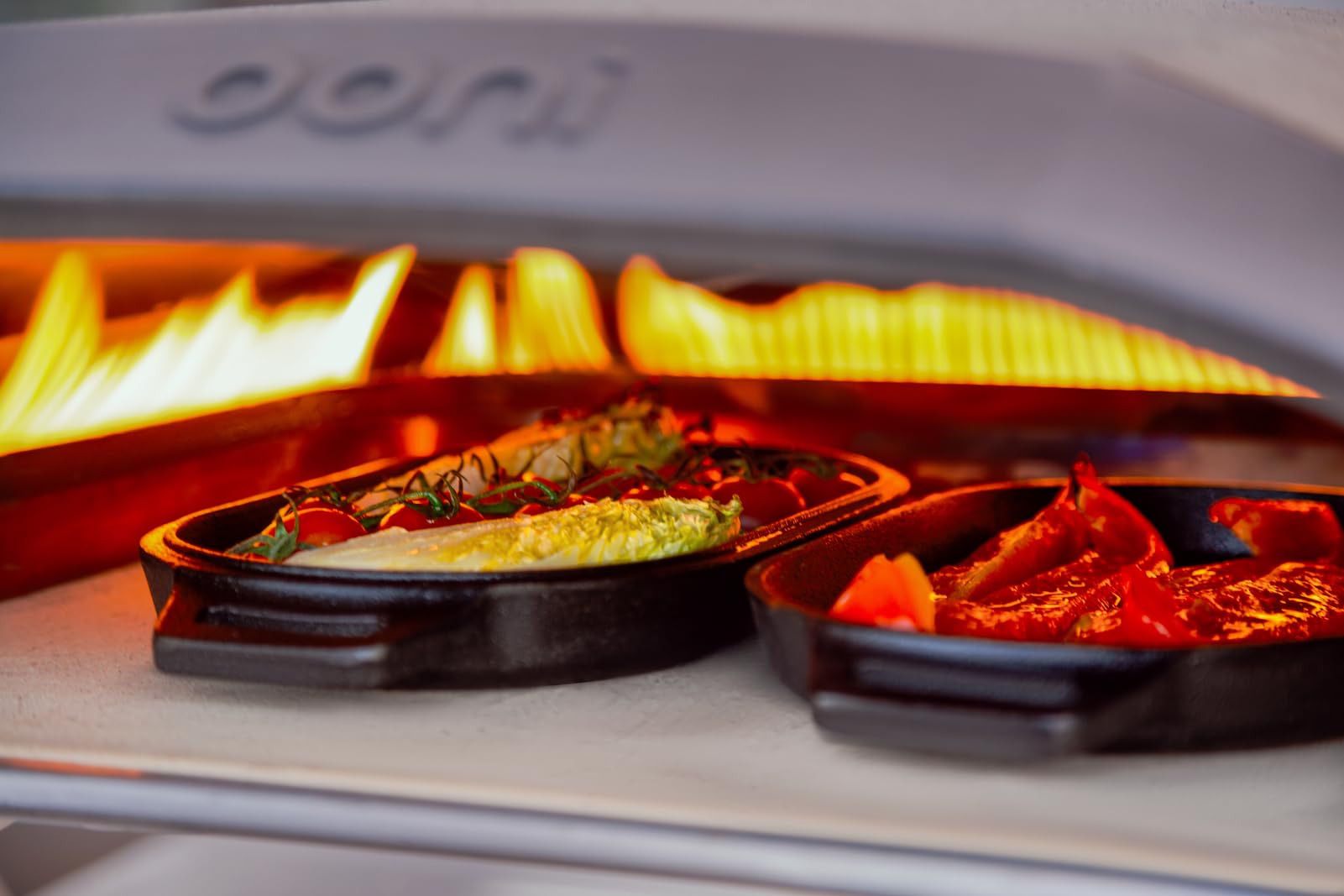 Ooni Cast Iron Sizzler Pan pre-seasoned surface ready for cooking.