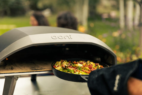 Ooni Cast Iron Skillet roasting vegetables to caramelized perfection.