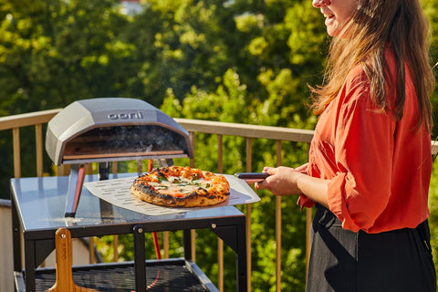 Ooni heat-resistant nylon handle offers safer handling near hot ovens.