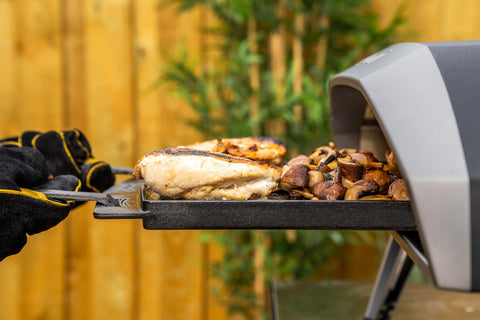 Ooni heavy-weight cast iron pan for durable, even heating