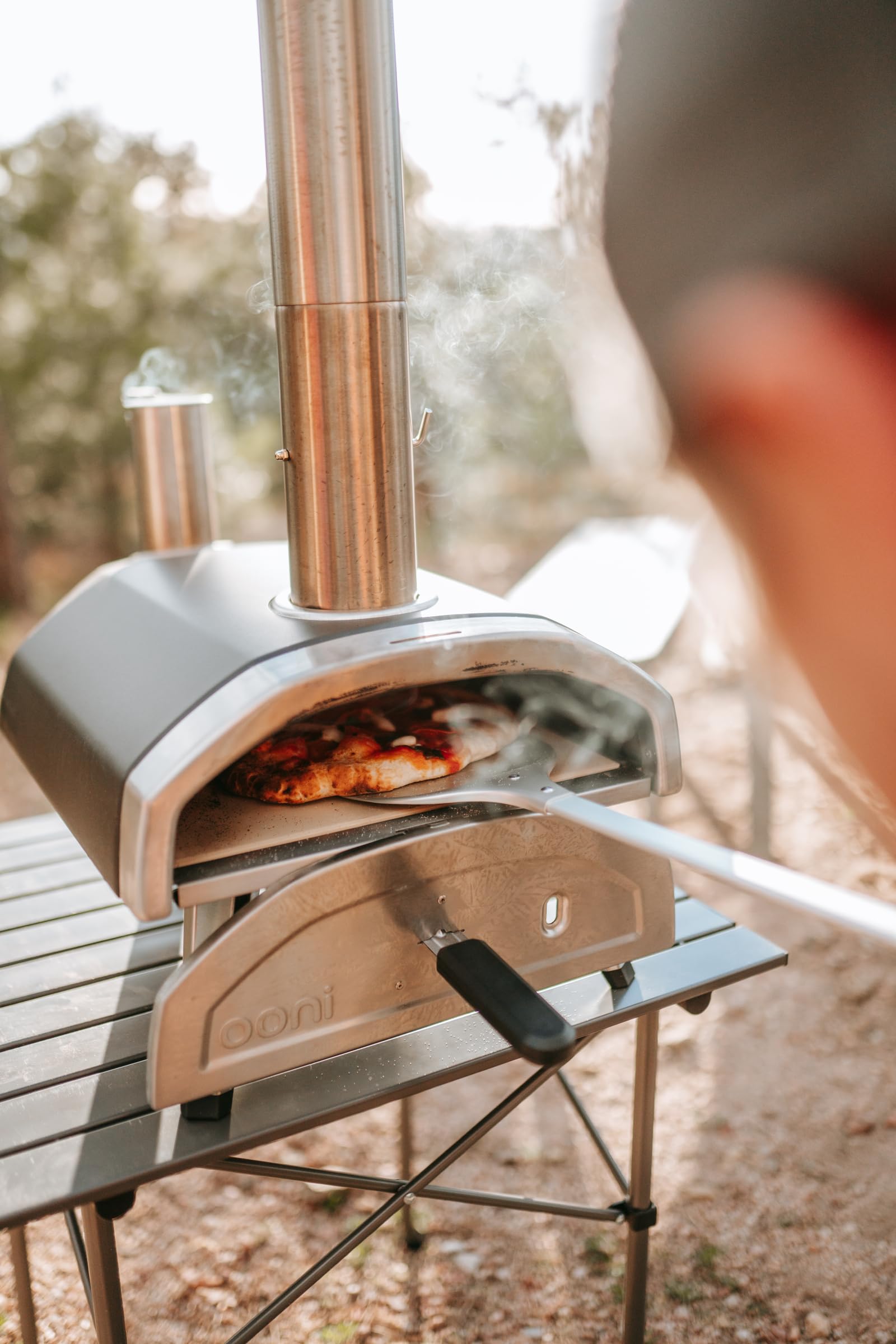 Ooni turning peel smooth slide helps you move pizza without sticking.