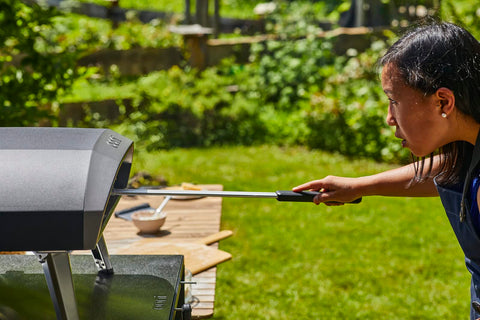 Ooni Pizza Turning Peel designed for oven use, enabling safe pizza handling in high heat.