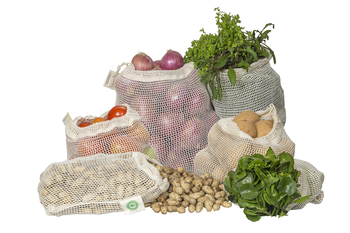 Organic Cotton Mart large mesh bag with drawstring for easy grocery shopping.