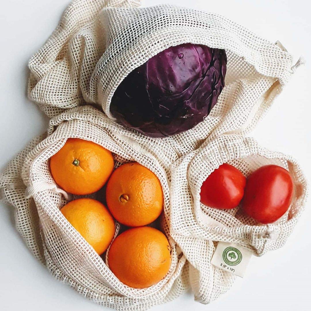 Organic Cotton Mart medium mesh bag with drawstring for versatile produce storage.