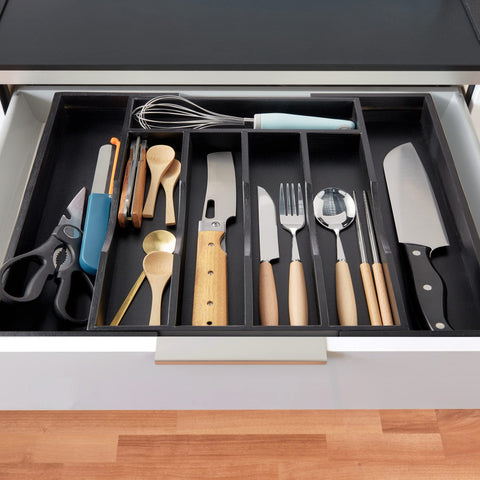 Oridom expandable tray fits most drawers, reducing clutter in kitchen.