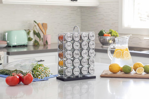 Orii spice rack featuring stainless steel accent caps for a modern kitchen look.