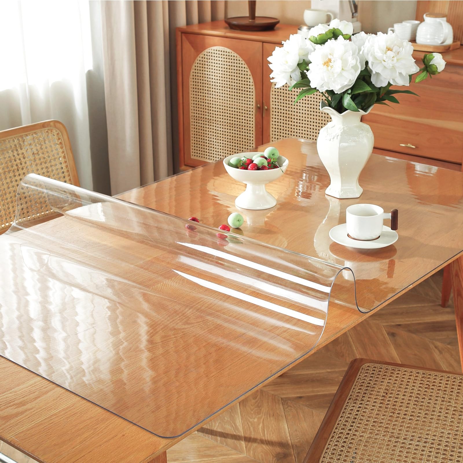 OstepDecor clear table protector on dining setup preserves table finish while dining