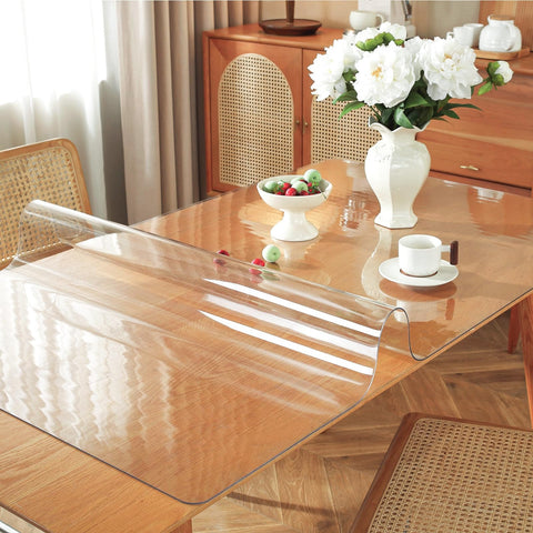 OstepDecor clear table protector on dining setup preserves table finish while dining