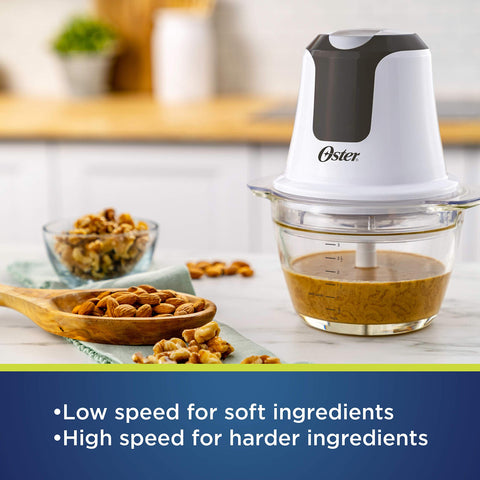 Oster chopper includes whisk attachment for quick whipping and baking prep.