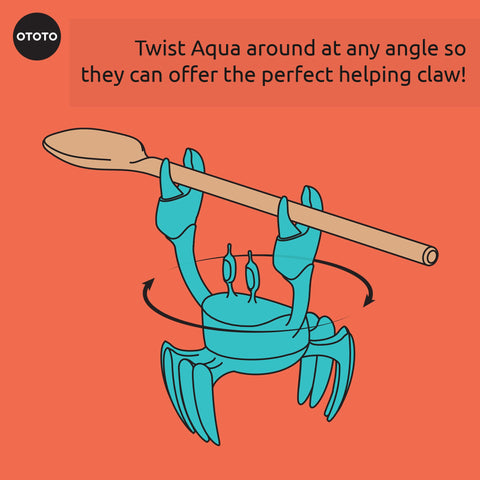 OTOTO Aqua the Crab keeps spoons organized on a busy kitchen counter