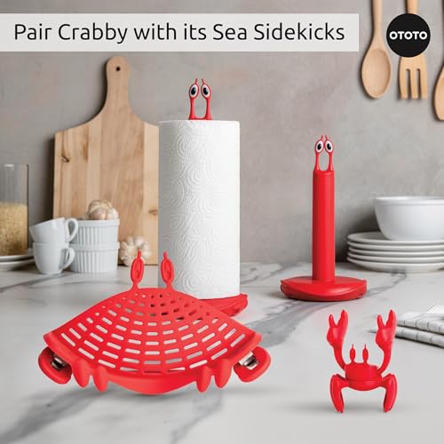 OTOTO Crabby clips onto pots for drip-free draining