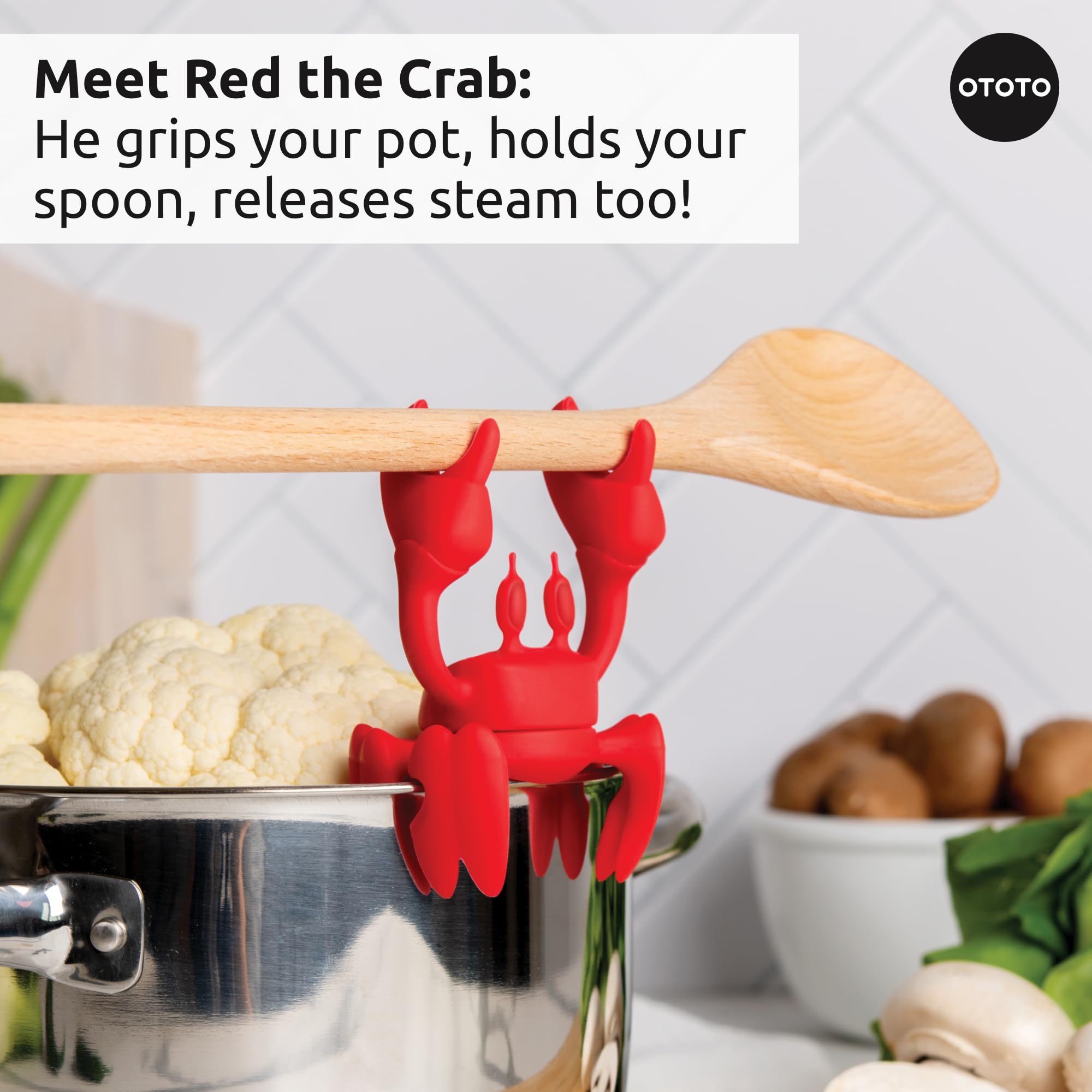 OTOTO Crabby pasta strainer clips onto pots for hands-free draining.