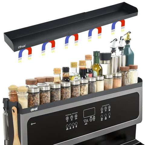OTraki shelf keeps spices organized near the cooktop.