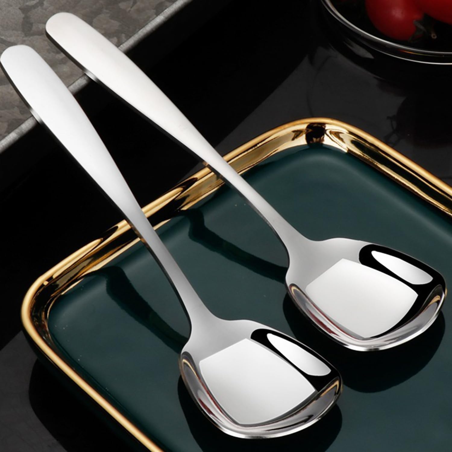 OULIGET curved-handle spoon offers a comfortable grip during serving