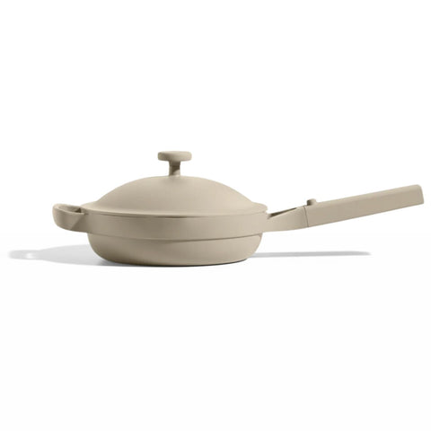 Our Place Mini Always Pan with modular lid on the stovetop for all-in-one cooking.