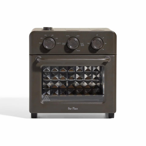 Our Place Wonder Oven front view highlights a sleek stainless steel finish for a modern kitchen.