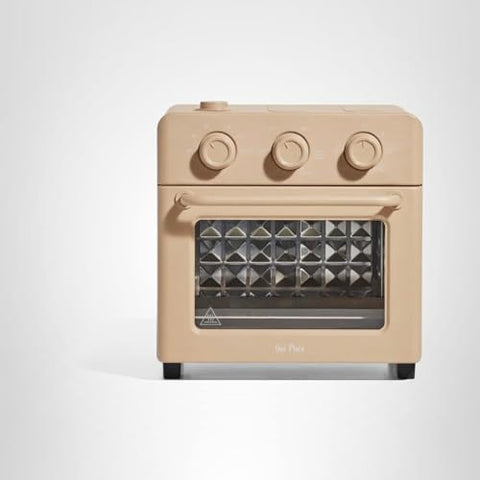 Our Place Wonder Oven fits a whole chicken with room to spare