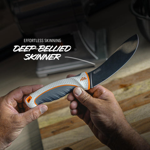 Outdoor Edge ErgoMax ergonomic rubberized handles for secure grip in slippery conditions.