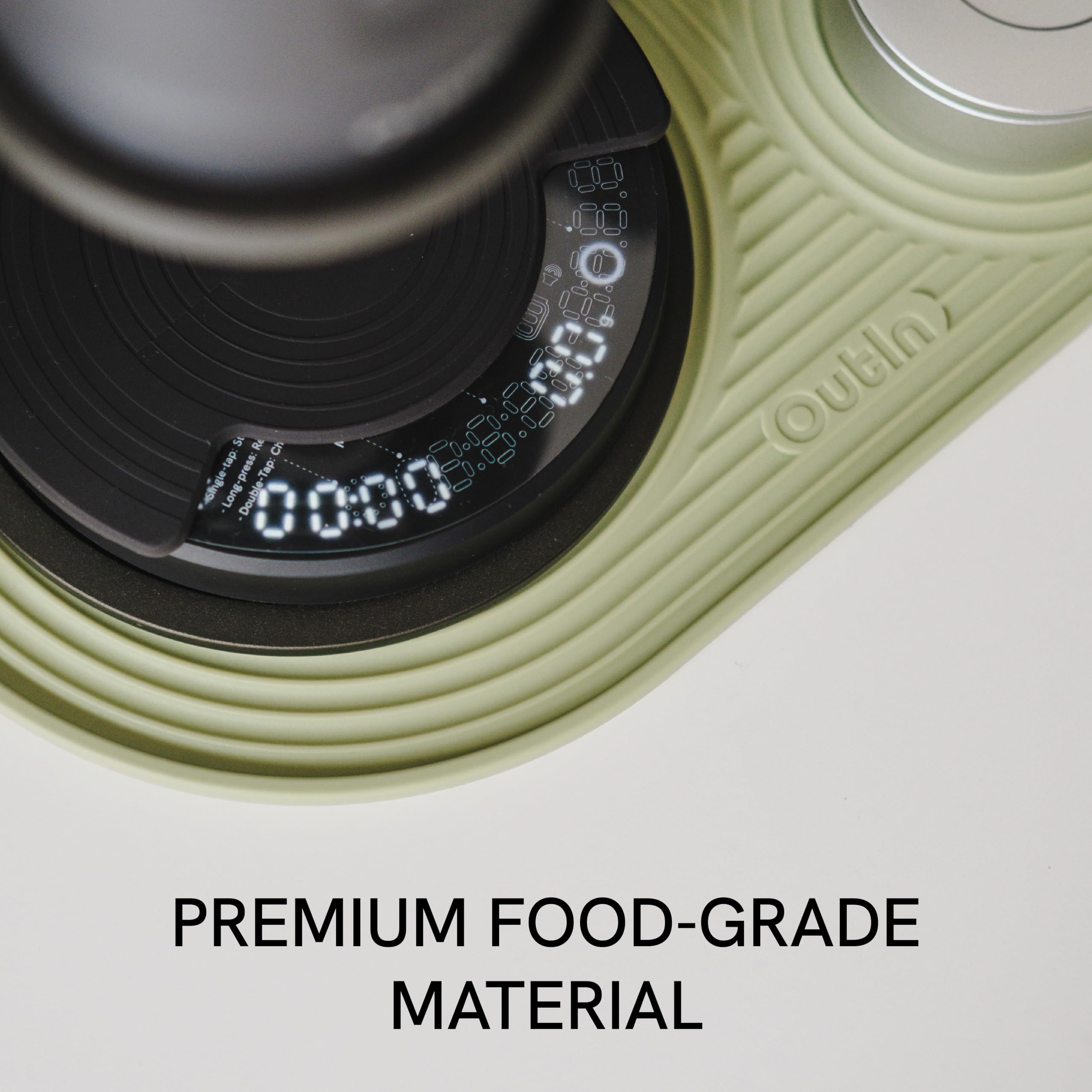 OutIn easy-clean surface lets you rinse away coffee grounds quickly.