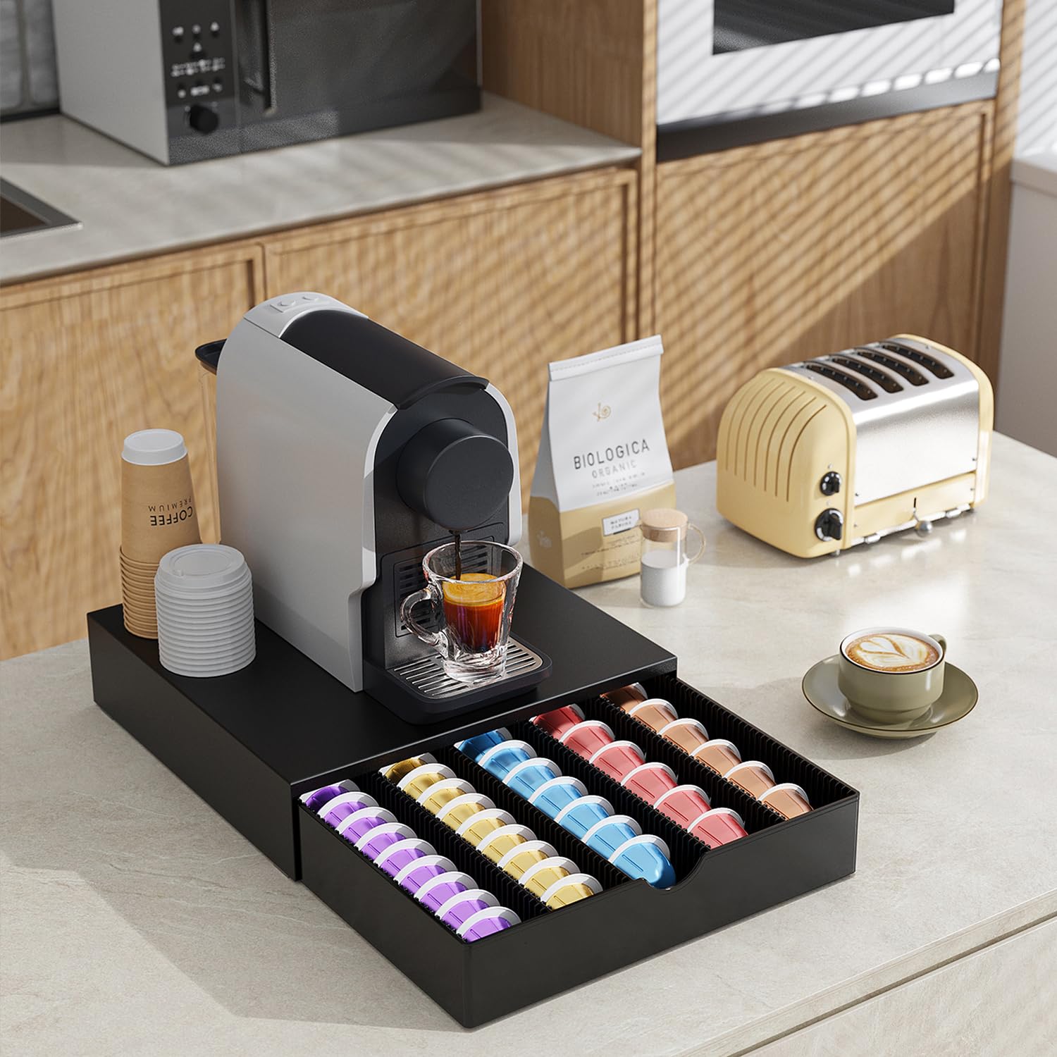 OUTIOE compact pod storage highlights capacity for 60 small Vertuo pods.