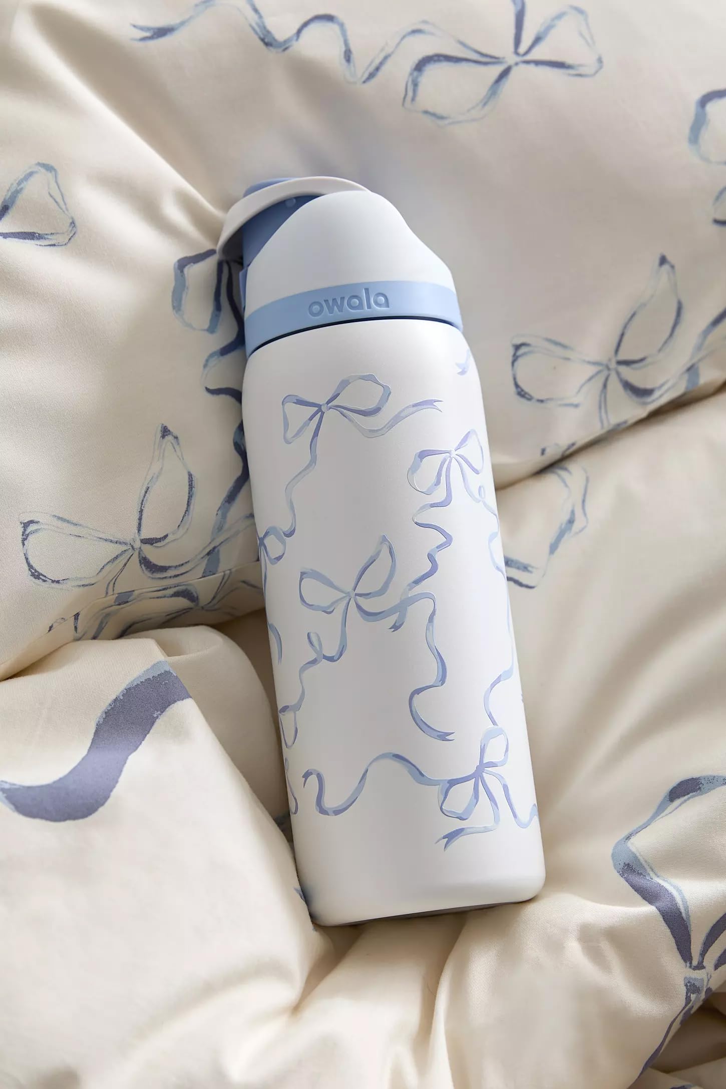 Close-up of FreeSip spout on Owala bottle for straw or wide-mouth use