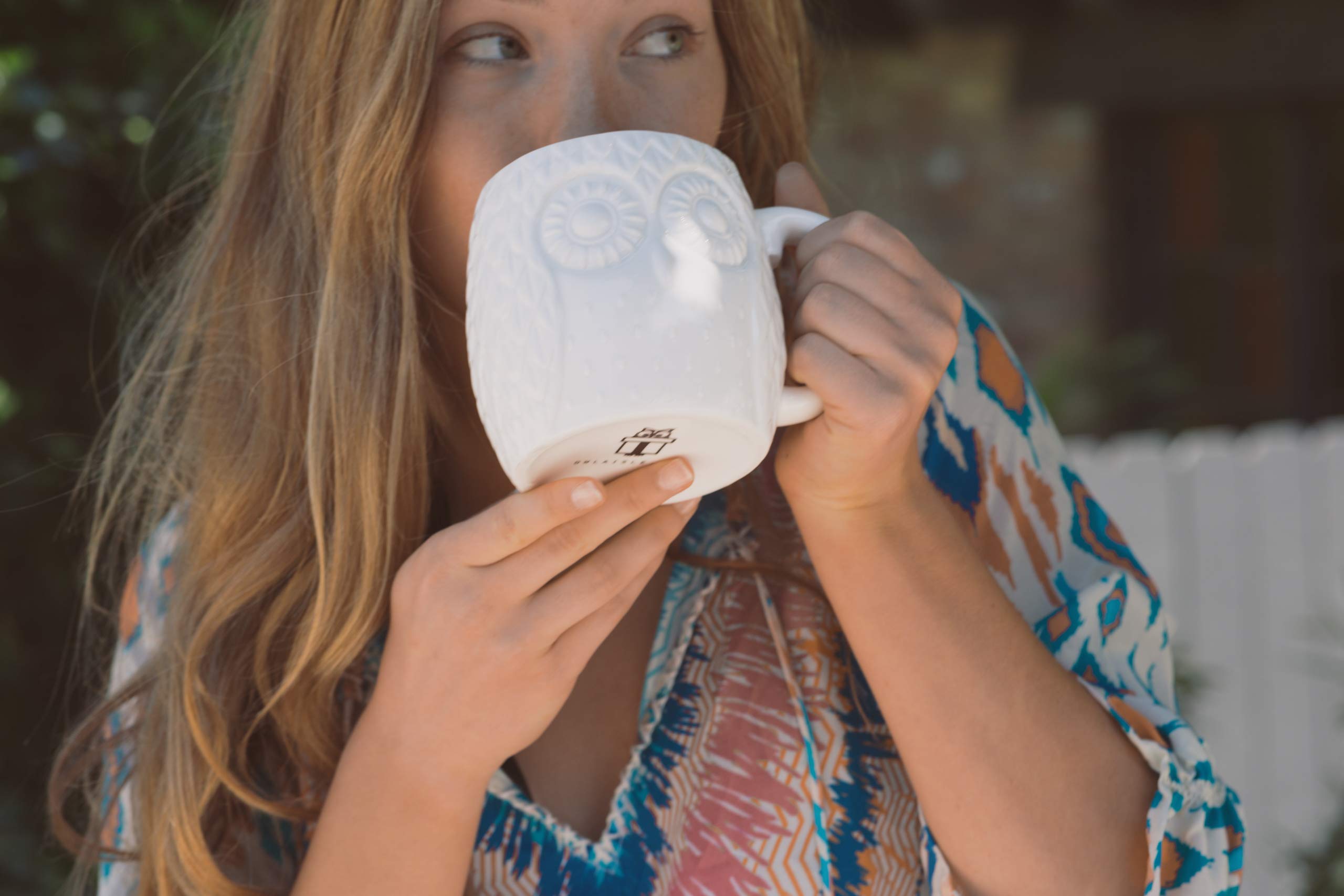 Owl Aisle mug highlights 3D texture around the owl design for tactile appeal.