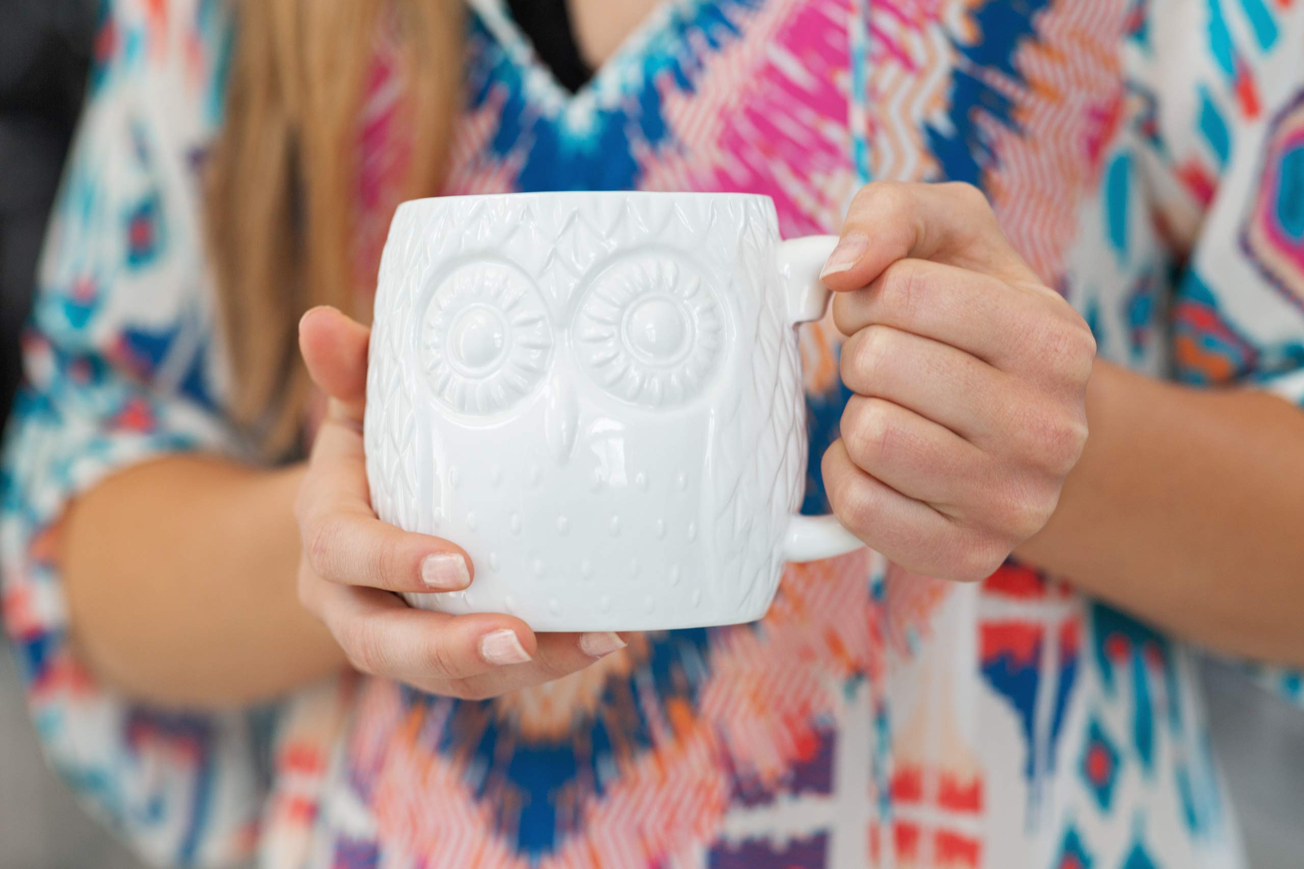 Owl Aisle mug with a cozy large handle for a comfortable grip.