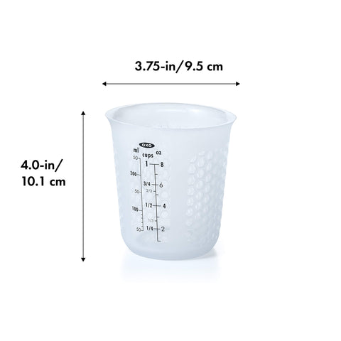 OXO Good Grips honeycomb-pattern silicone cup protects hands from heat during microwaving
