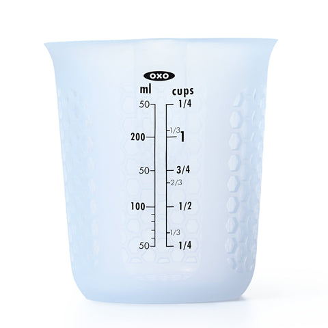 OXO Good Grips squeeze-pour silicone measuring cup shows precise 1-cup markings for easy measuring