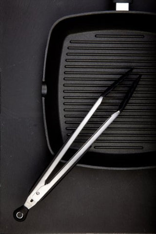 OXO Good Grips 12-Inch Tongs safe for non-stick cookware on kitchen counter