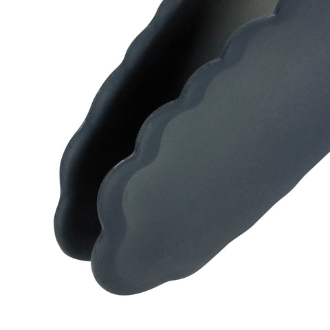 OXO Good Grips 12-Inch Tongs in use flipping vegetables on a hot skillet