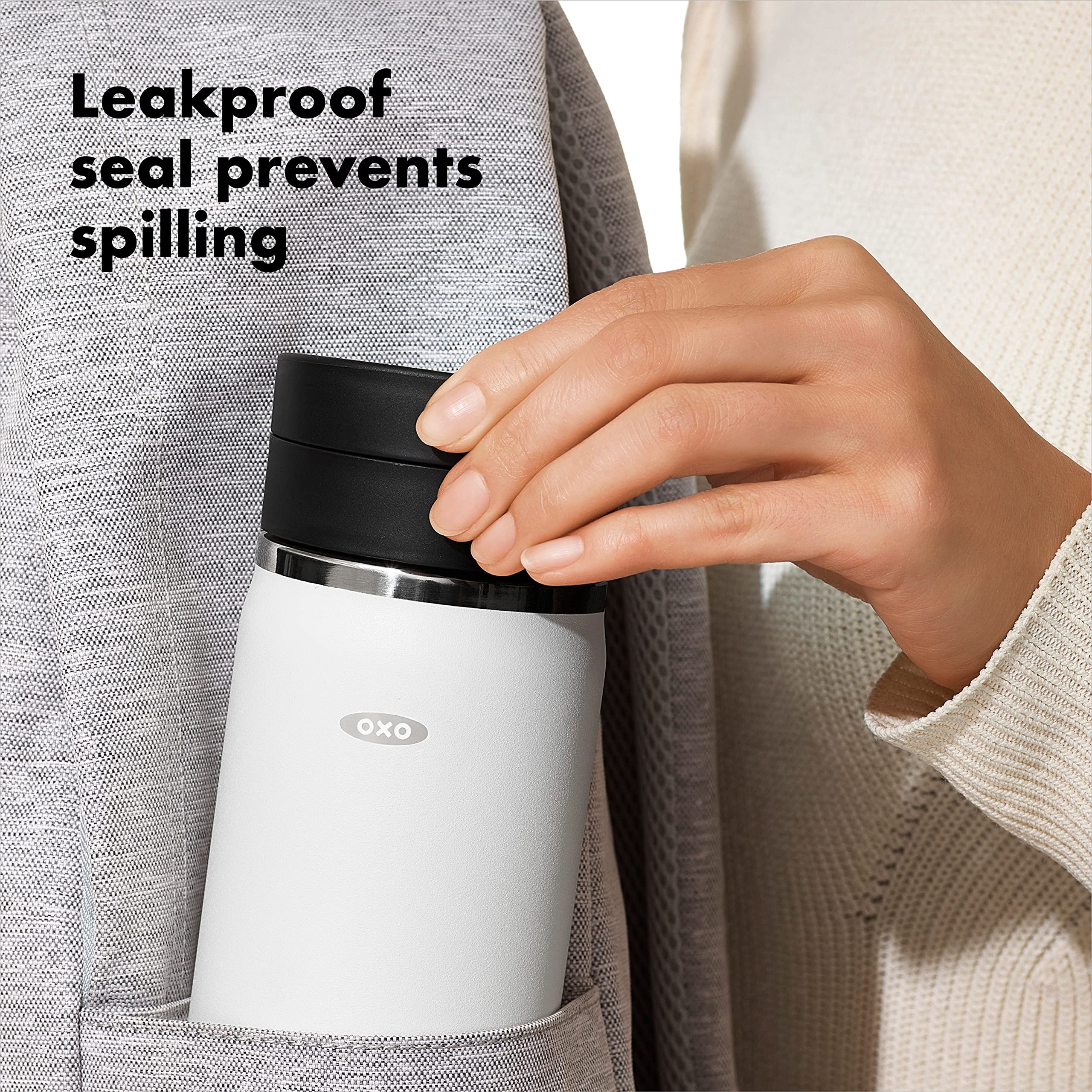OXO Good Grips mug with sweatproof coating for a secure grip during travel.