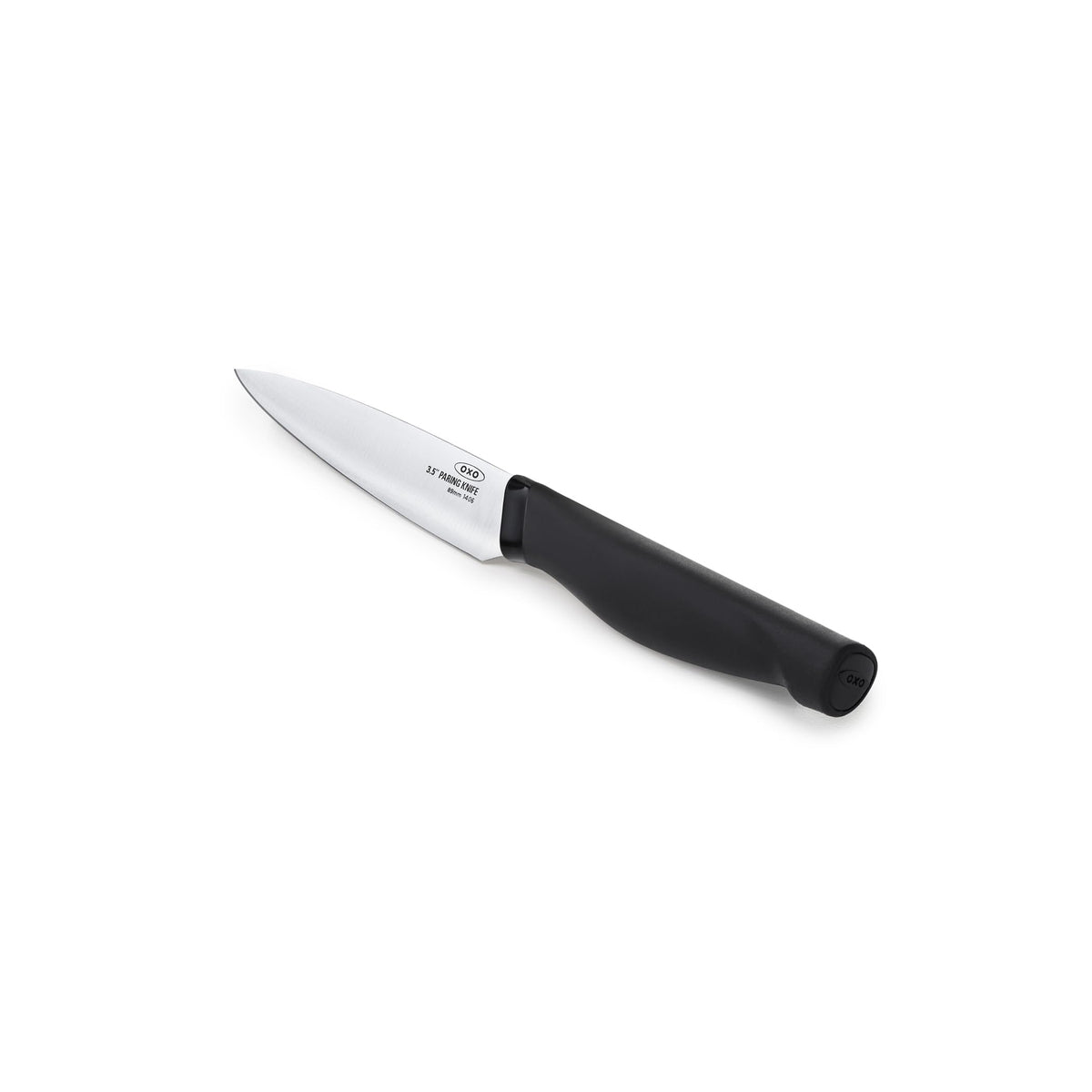 OXO Good Grips paring knife blade close-up highlighting sharp steel for precise peeling.