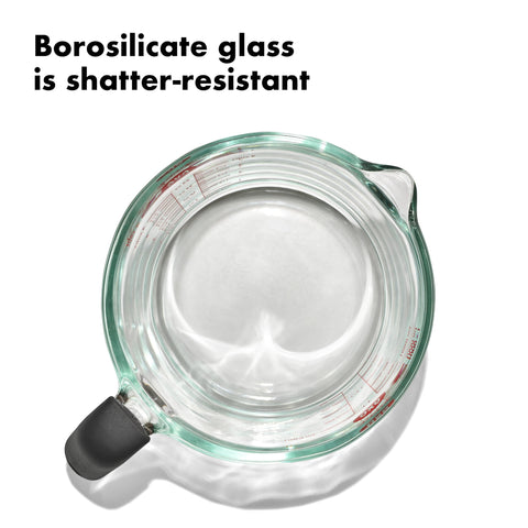 OXO Good Grips 4-Cup Glass Measuring Cup side view highlights comfortable non-slip handle.