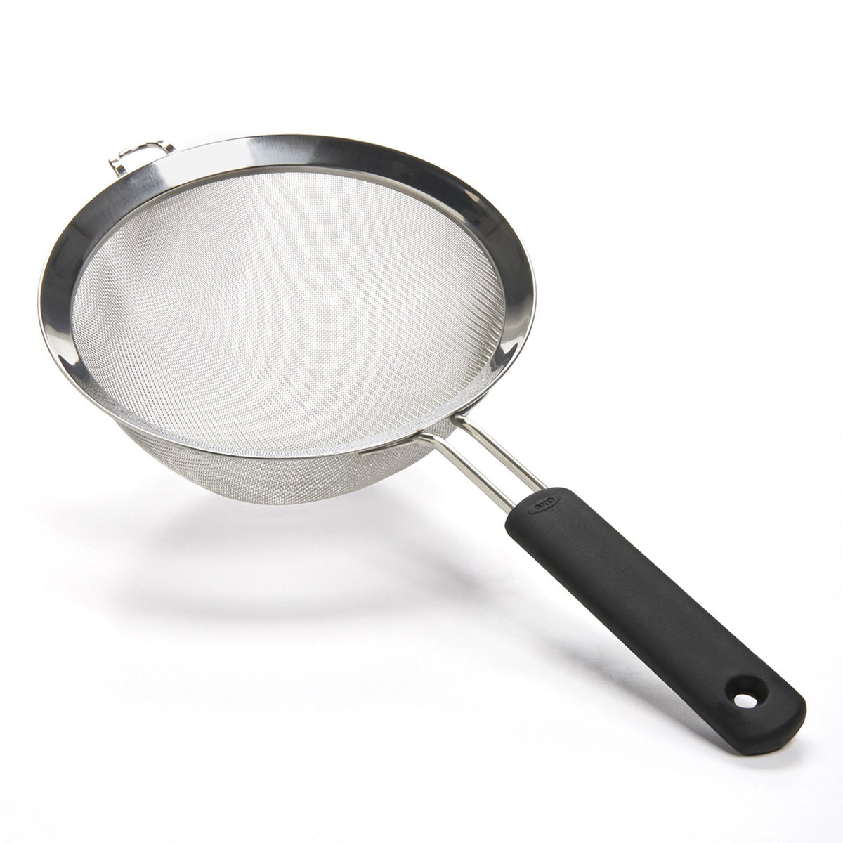 OXO Good Grips 8 inch strainer with fine mesh for precise draining of fruit and pasta.