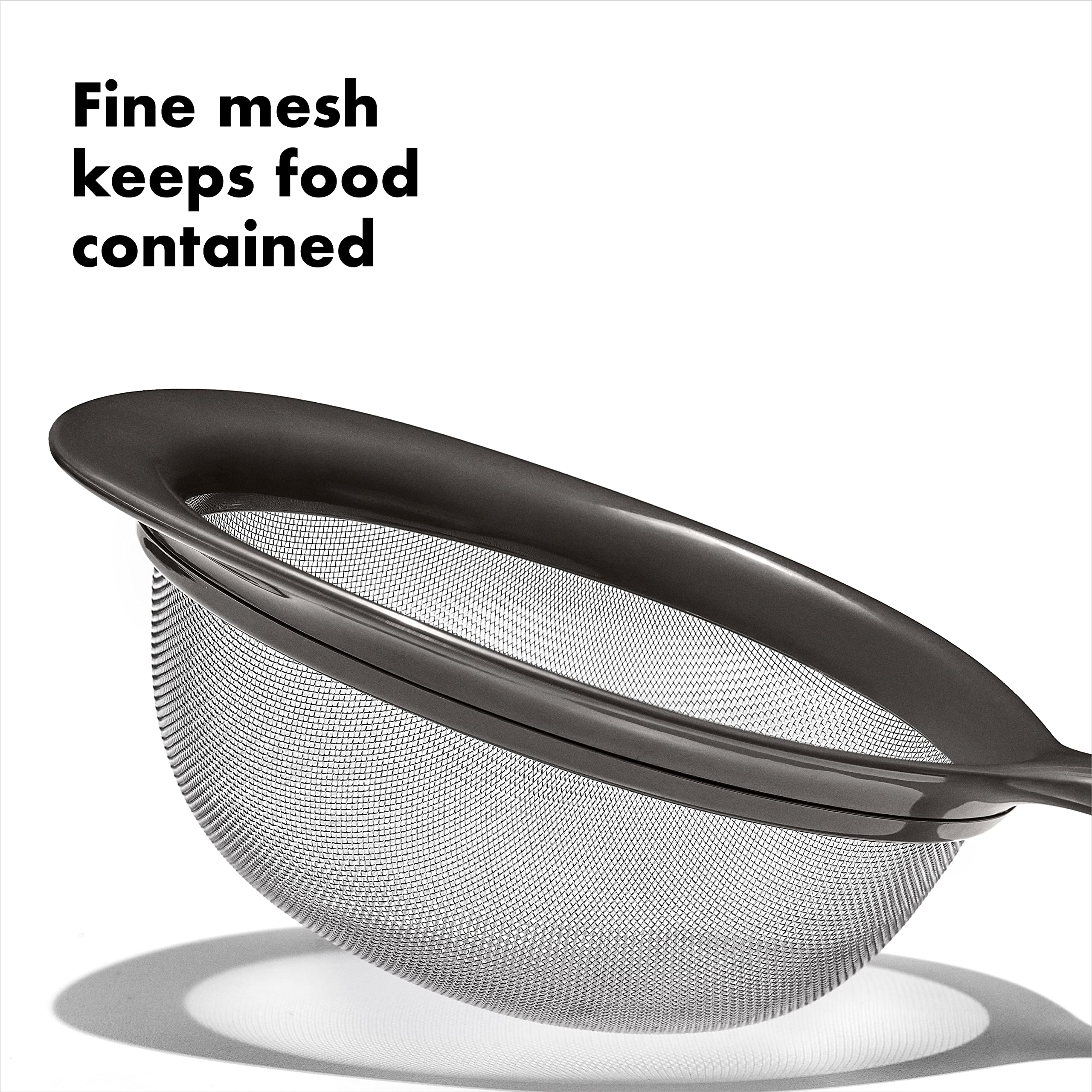 OXO Good Grips 8-inch fine-mesh strainer draining pasta smoothly.