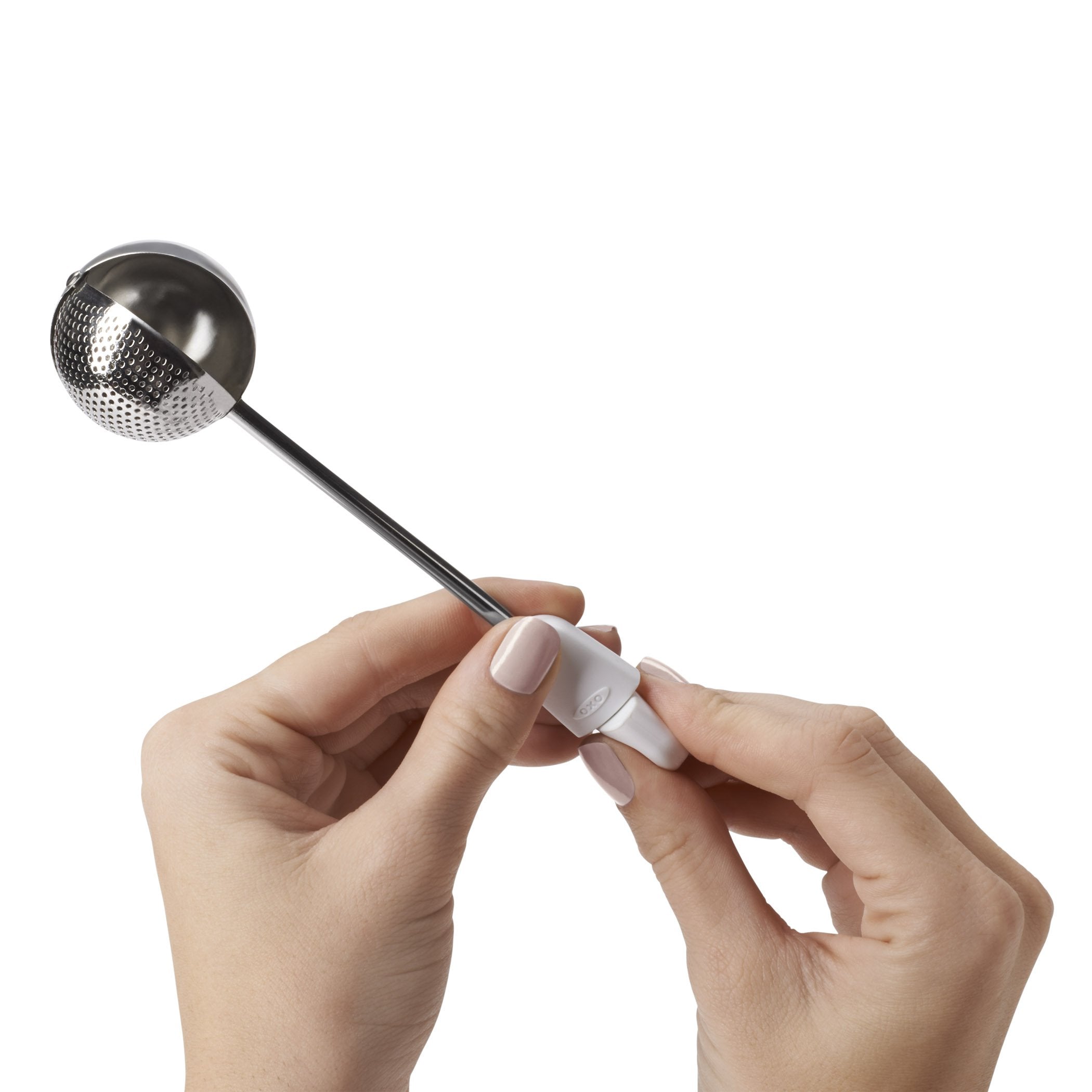 OXO Good Grips Baker's Dusting Wand hanging from its pull-tab hole