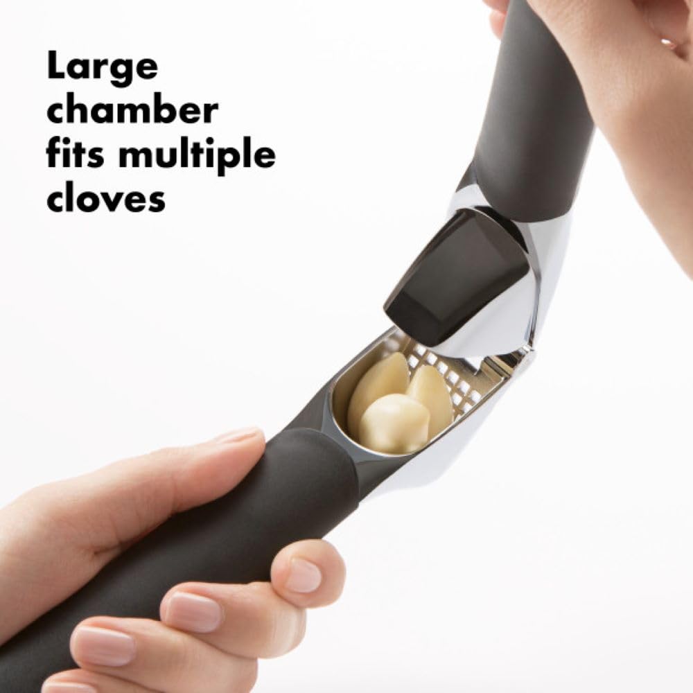 OXO built-in cleaner ejects peels to save cleanup time.