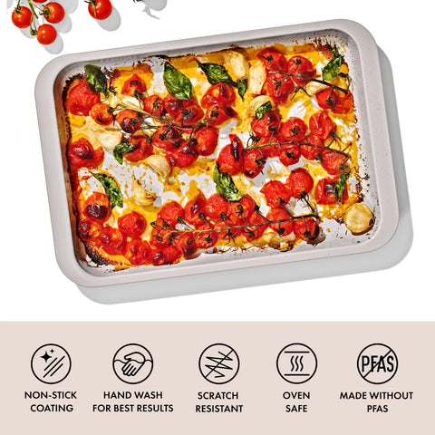 OXO Good Grips ceramic-coated bakeware handles for secure oven transfers.