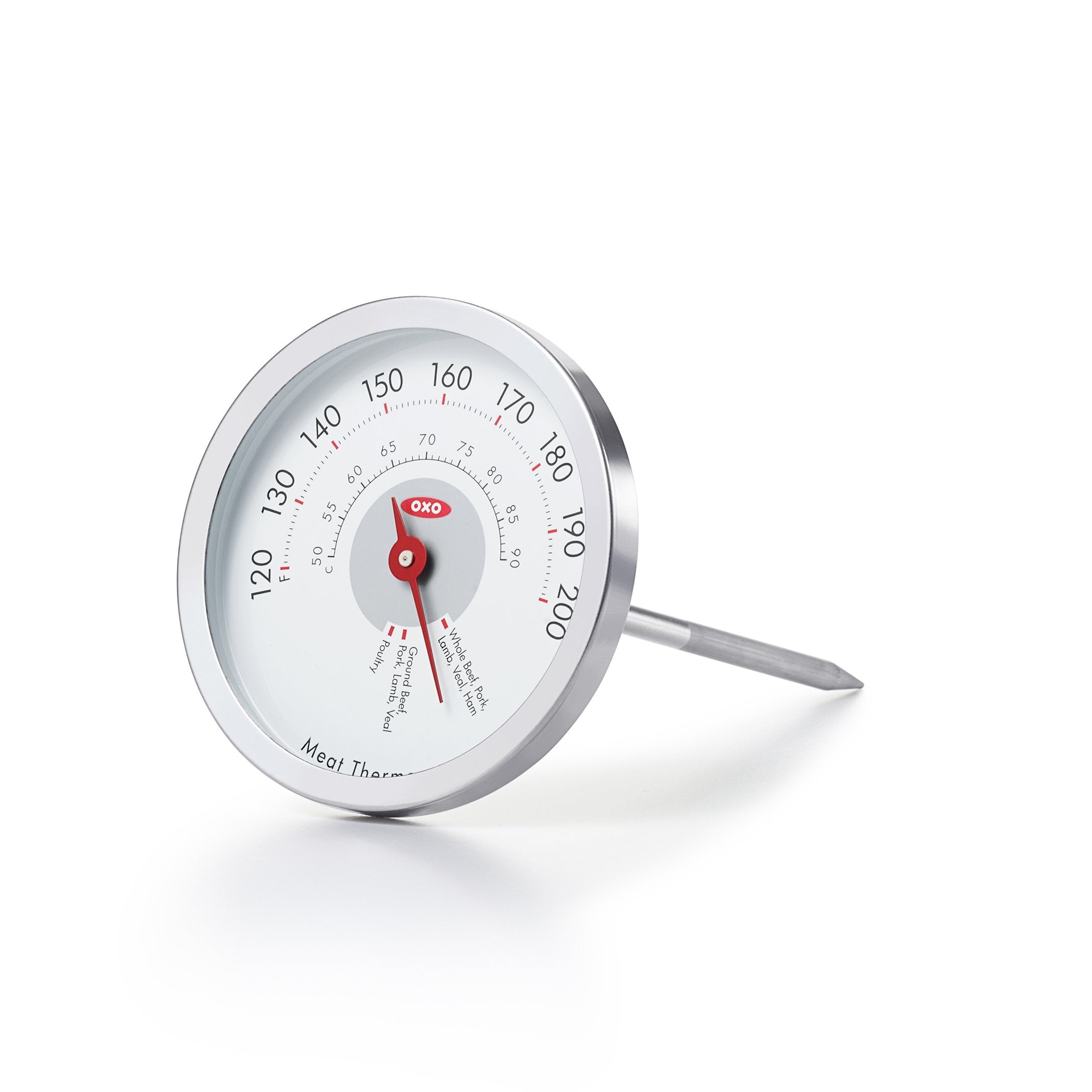 OXO Good Grips Chef's Precision analog thermometer in meat for steady, accurate cooking readings.